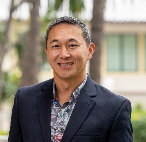 Picture of Jason Chang with trees in background